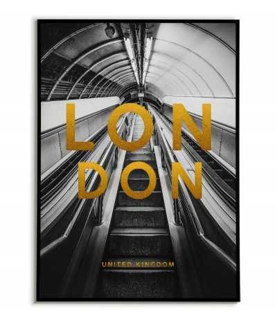 a poster with a city of London with a photo of the subway and gold subtitles