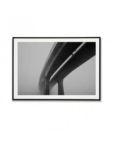 Prints on the wall in the form of a poster with a photograph of the bridge in the fog. Black and white picture Prints on the wall in the form of a poster with a photograph of the bridge in the fog. Black and white picture