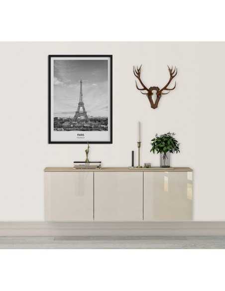 Poster with Paris and the Eiffel tower with a signature. Poster with city on the wall.