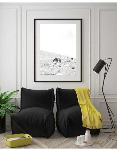 Scandinavian black-and-white poster with a wild horse grazing in the mountains Scandinavian black-and-white poster with a wild horse grazing in the mountains